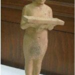 AKHENATEN CARRYING AN OFFERING TRAY 1
