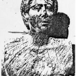 HEAD OF A WOODEN STATUE 64