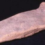 PLAQUE IN THE FORM OF A BED 103